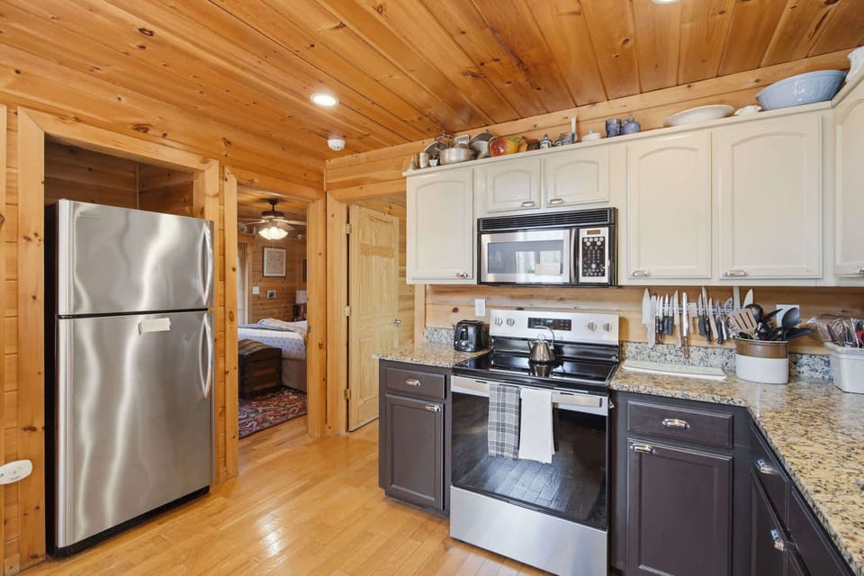 The open kitchen offers ample space & all the comforts of home​
