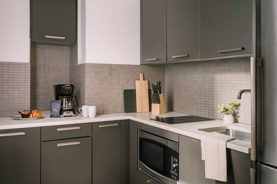 Standard Studio, 1 Queen Bed | Private kitchen | Full-size fridge, microwave, stovetop, dishwasher