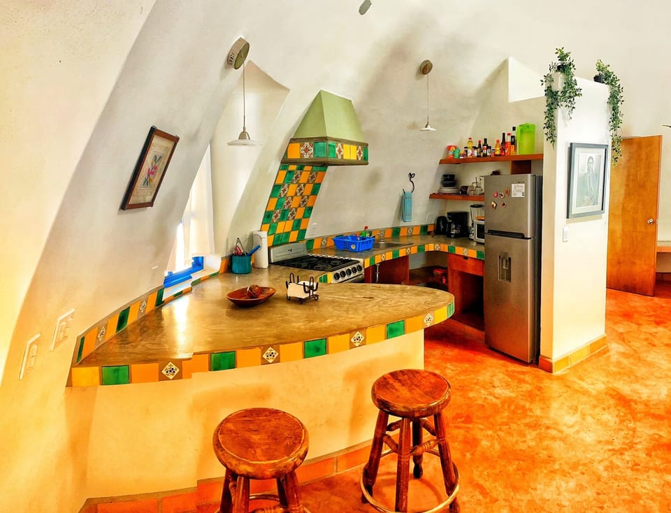 Signature Studio Suite, Garden View | Private kitchen | Coffee/tea maker, electric kettle