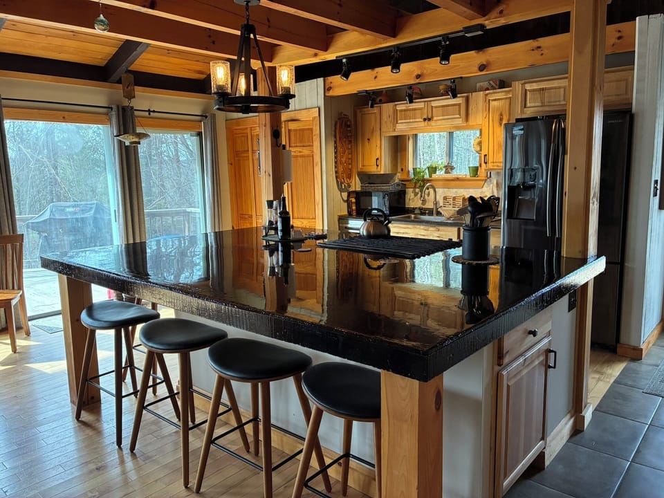 fully stocked kitchen with large pantry and gas range