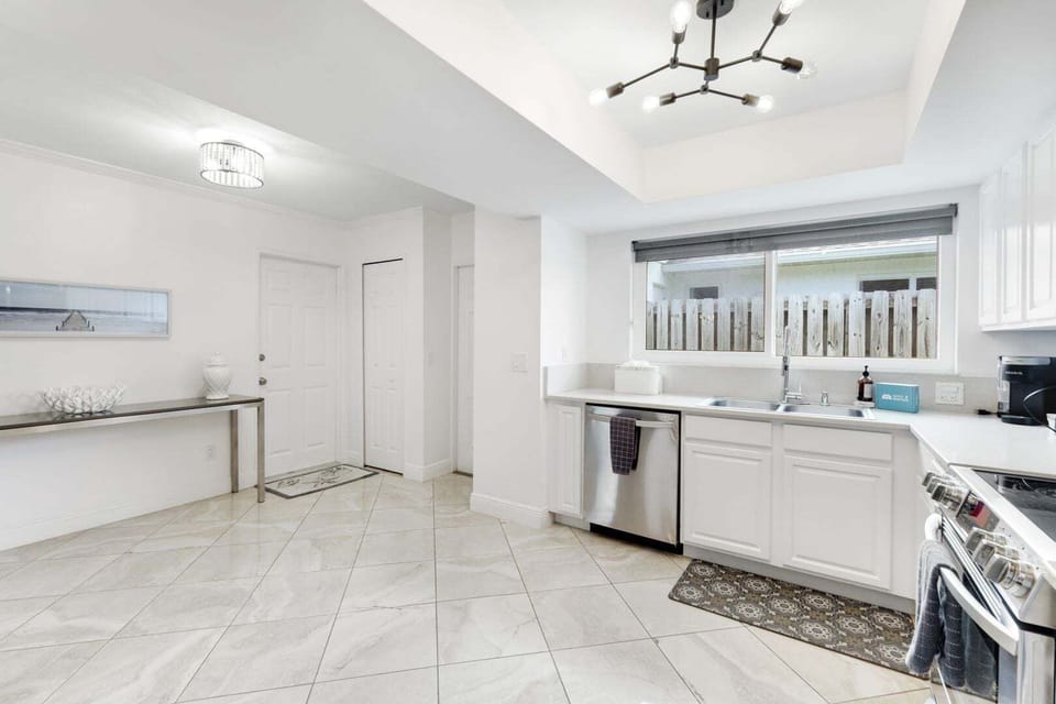 Bright, open kitchen with modern finishes, ample space, and a clean, airy layout—perfect for cooking and gathering.