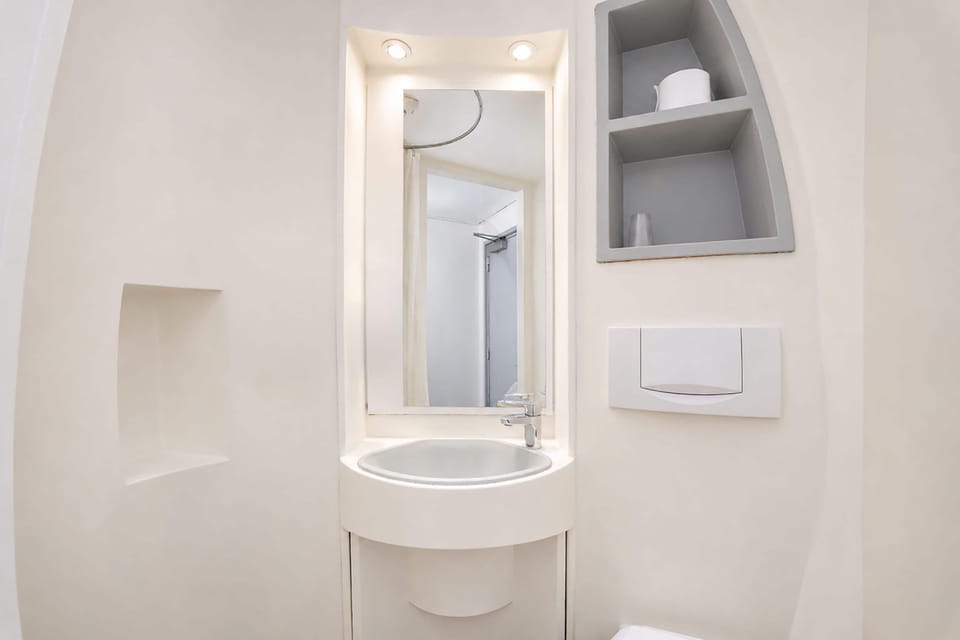 Small Double Room - No Window | Bathroom | Shower, towels, toilet paper
