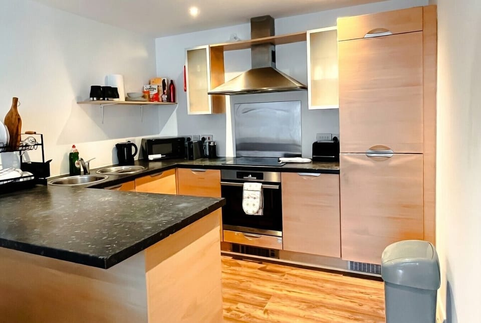 Well-stocked kitchen with granite worktops, oven, hob and everything you need to cook for a group.