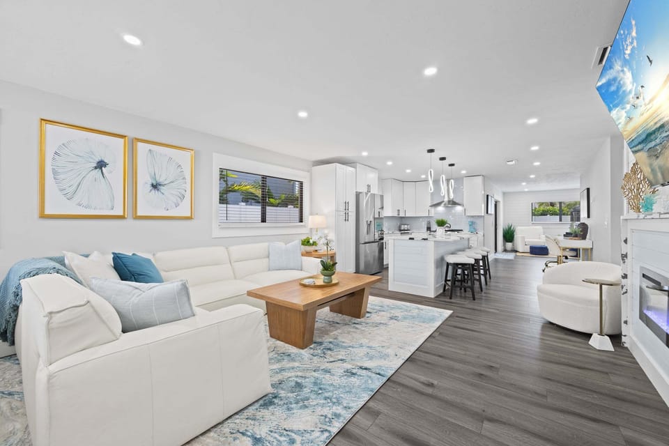 Spacious open-concept layout connecting living, dining, and kitchen—ideal for relaxing and entertaining.