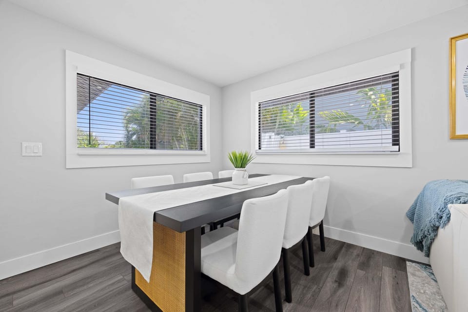 Bright dining area with seating for six—perfect for shared meals and gathering together.