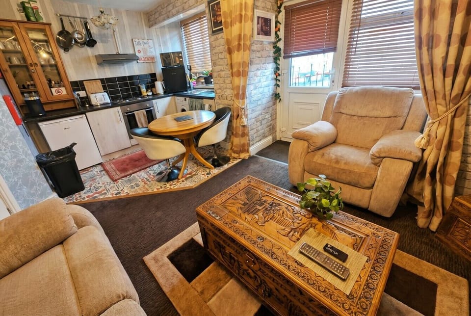 Open-plan lounge and fully equipped kitchen make home cooking easy.
