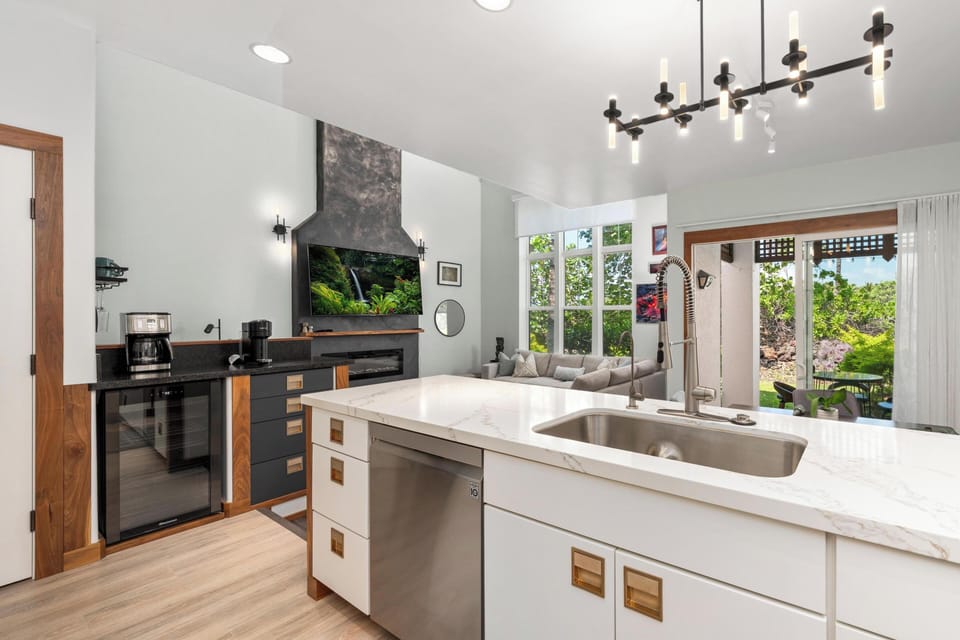 Your gourmet kitchen flows into the living space, where modern fixtures and sleek countertops create the perfect setting for memorable meals.