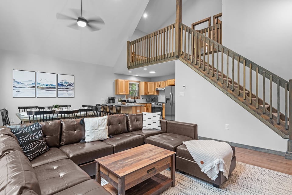 Sit Back & Relax – A warm and welcoming living area with plush seating and a cozy atmosphere.
