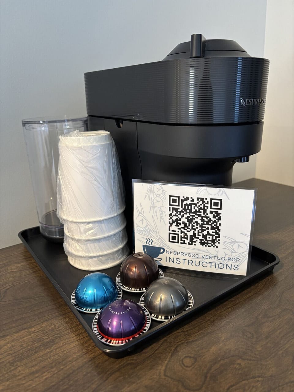 Modern Nespresso coffee station with premium espresso pods and convenient in-room comfort.