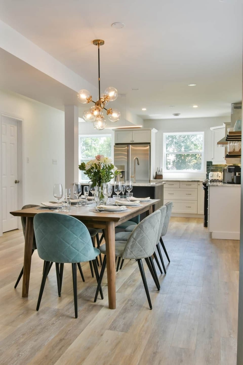 The dining room with dining for 8 and easy access to the airy kitchen 