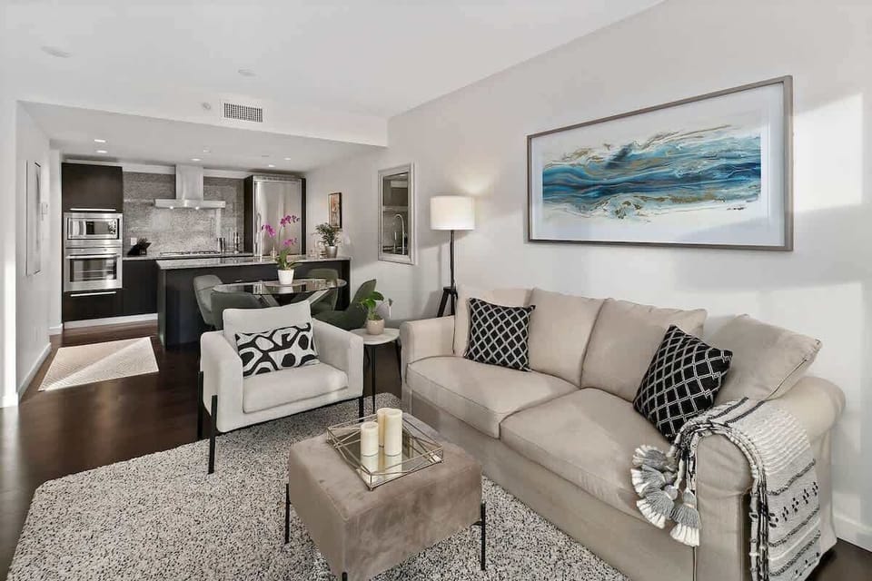 Sophisticted south facing living area with queen size sleep sofa.