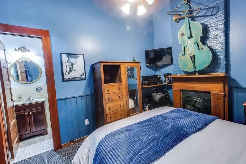 Bedroom view featuring stylish decor and a warm, welcoming atmosphere for a restful stay.