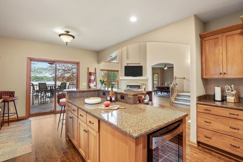 Spacious kitchen with all needed appliances and amenities for cooking and dining at home