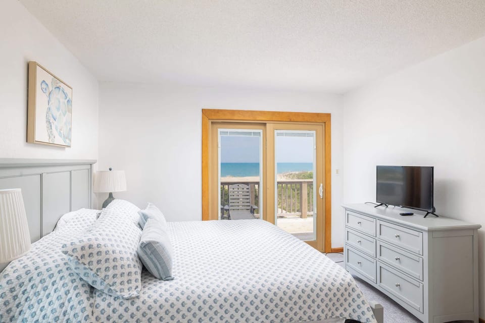 Top Level: Primary King Bedroom with Ocean Views and En-Suite Bathroom