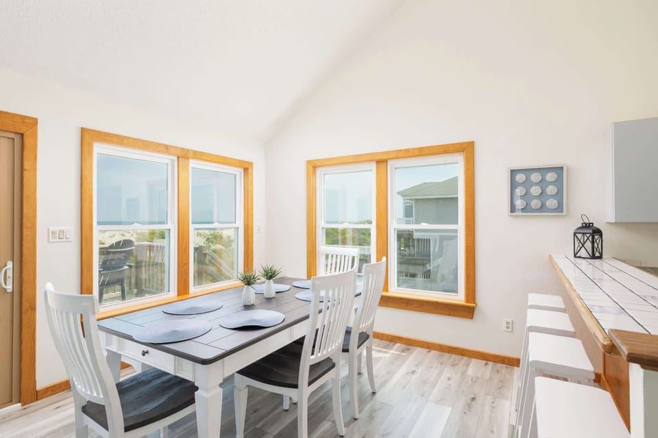 Top Level: Dining Area & Kitchen with Bar Seating