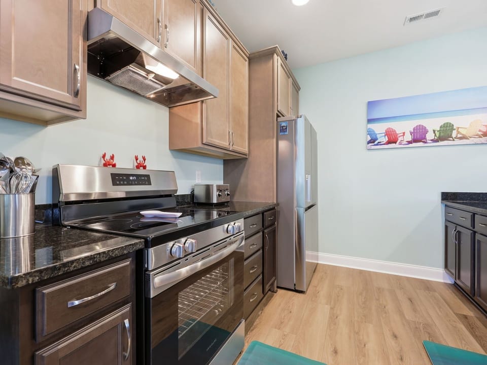 Fully equipped kitchen with modern appliances and ample counter space