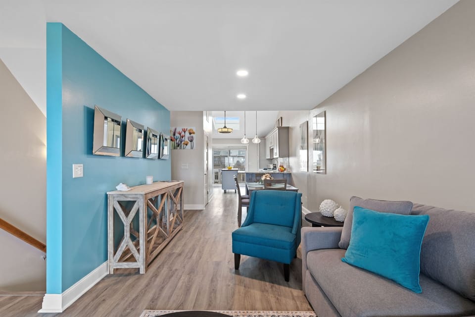 A relaxed living space that keeps everyone connected from couch to kitchen