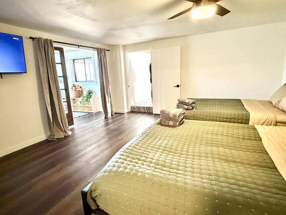 Comfortably sleep your whole group in this spacious guest room featuring two plush queen beds with premium bedding.