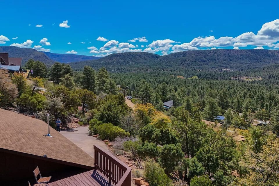 Sweeping 180° views of the forested valley below — a rare find that will leave your guests speechless.