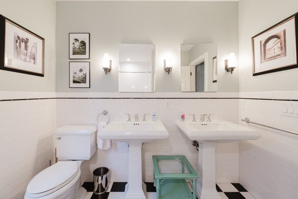 Bathroom #1 ensuite to the first bedroom with double sinks and tub/shower