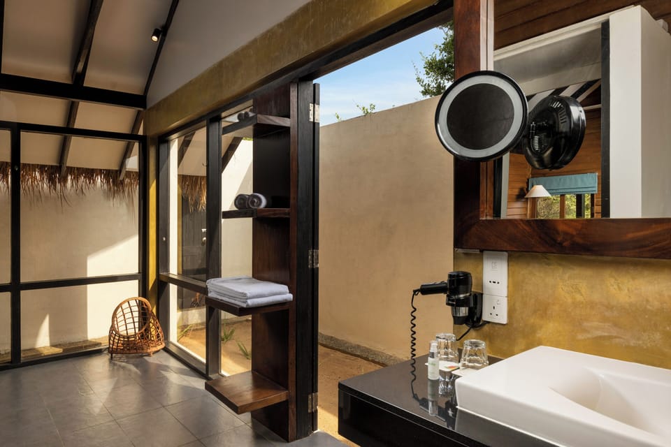 Jungle Dwelling | Bathroom | Shower, rainfall showerhead, free toiletries, hair dryer