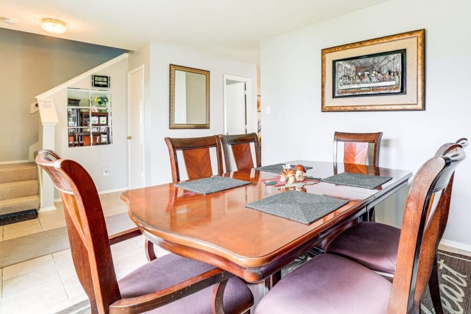 Dining Area | Wood Table | Staircase Access & Wall Mirror