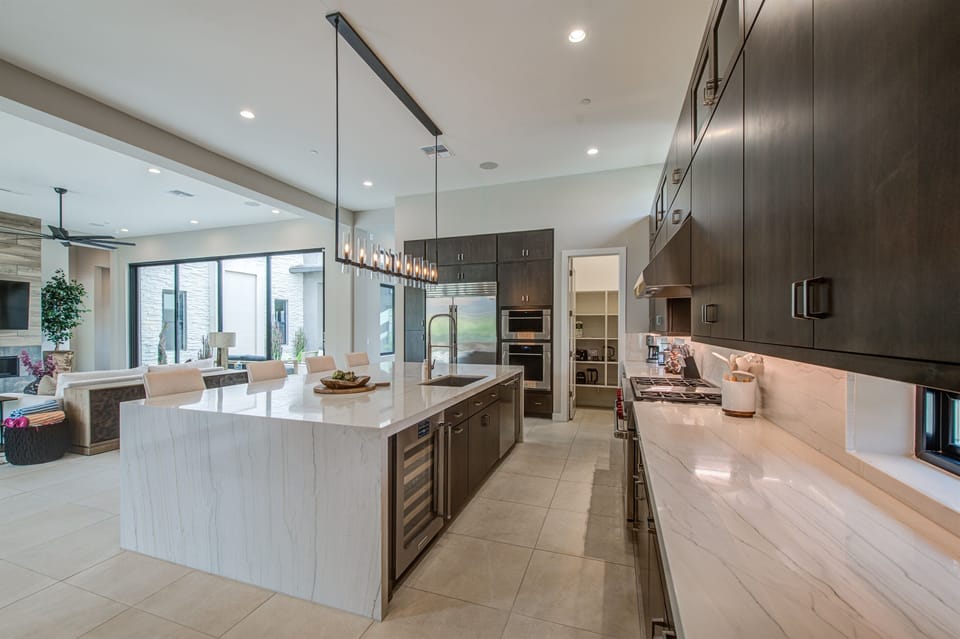 Bright, open-concept kitchen with high-end appliances, perfect for family breakfasts and easy conversation.