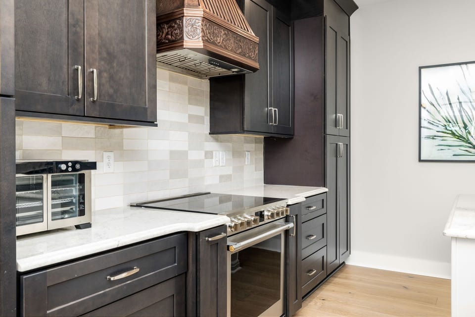 Clean and functional space for cooking, dining, and entertaining.