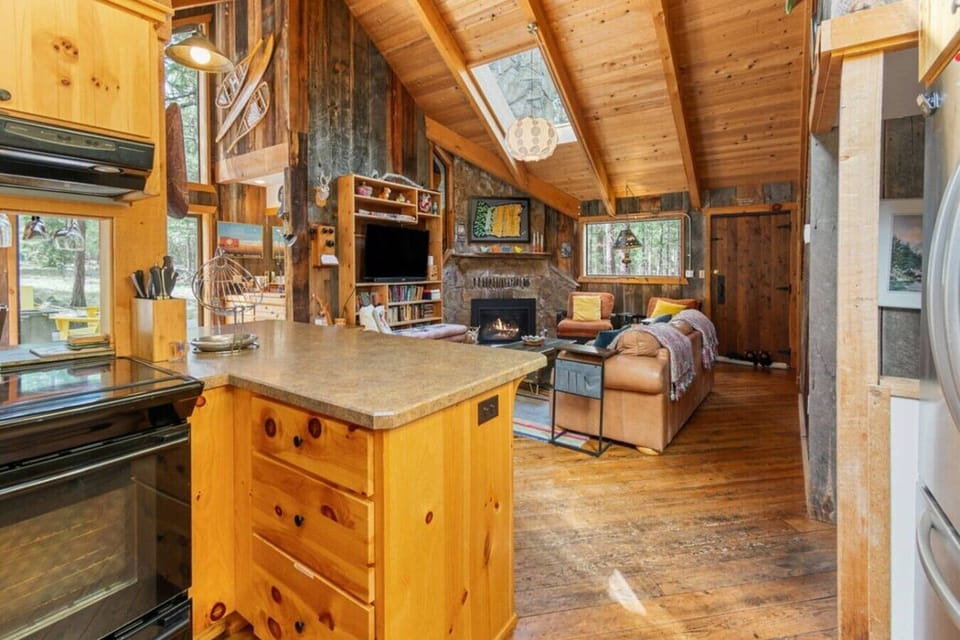 Open layout connects kitchen, dining, and living spaces