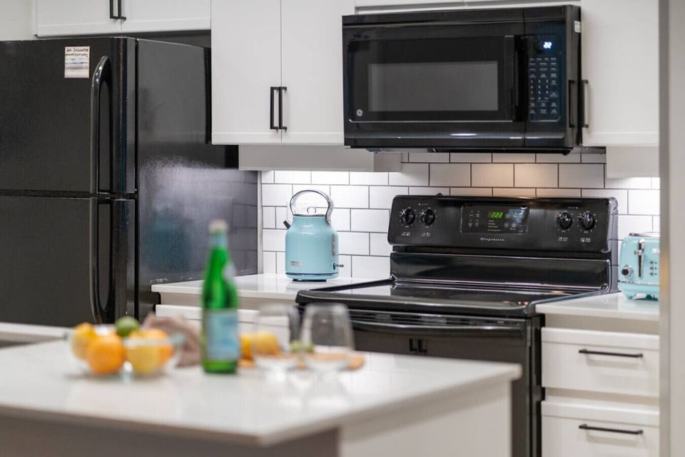 Detail showcasing spotless kitchen and large cooking space