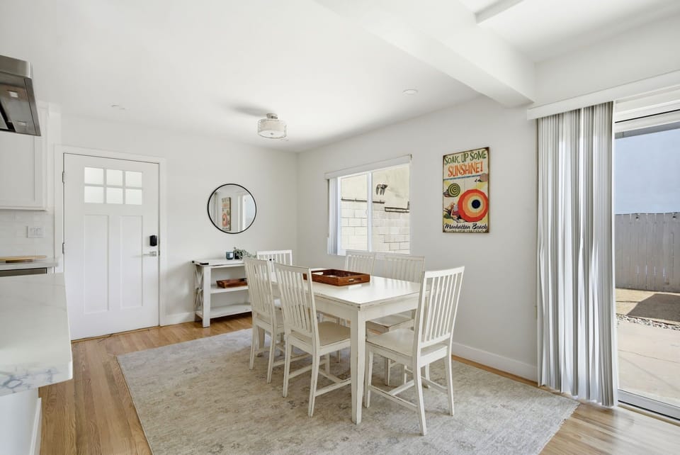 Dining area with seating for four and easy access to the outdoor patio