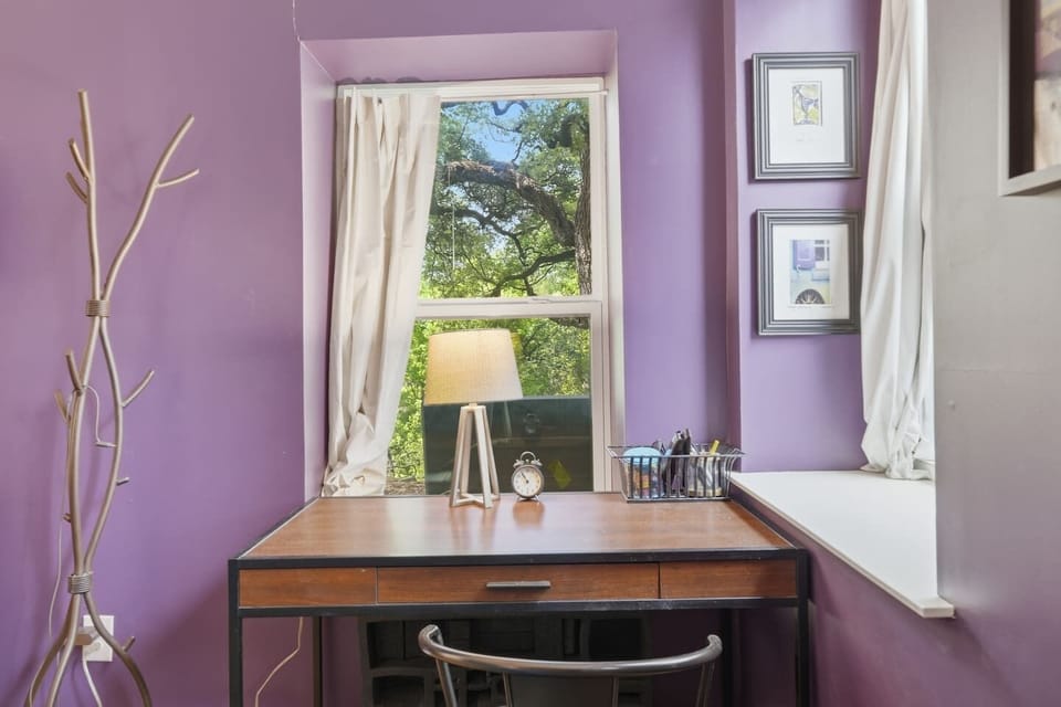 Peaceful work area with desk space and comfortable seating