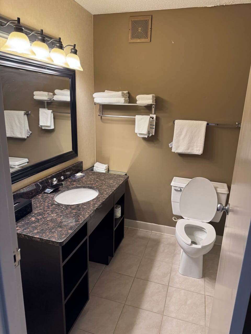 Bathtub, hair dryer, towels, soap