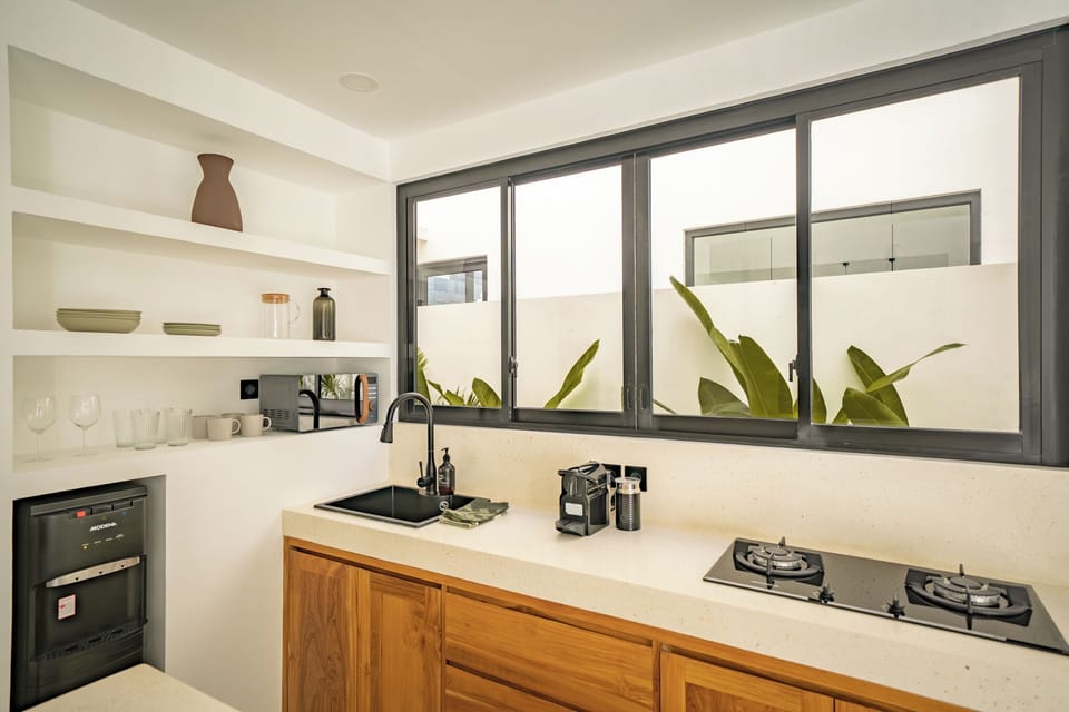 Deluxe Villa, 1 King Bed, Pool View | Private kitchen | Coffee/tea maker, electric kettle