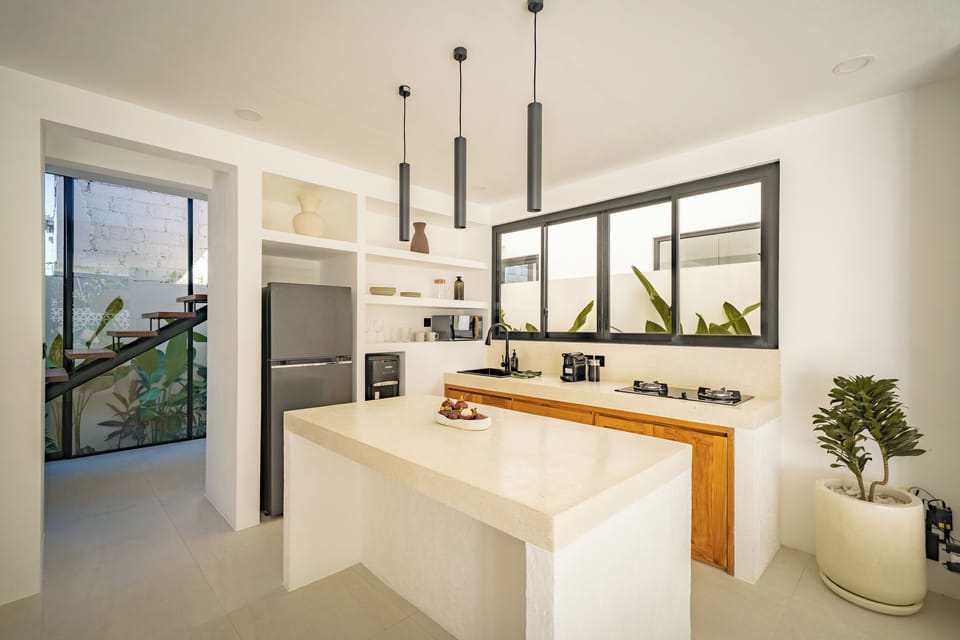 Deluxe Villa, 1 King Bed, Pool View | Private kitchen | Coffee/tea maker, electric kettle