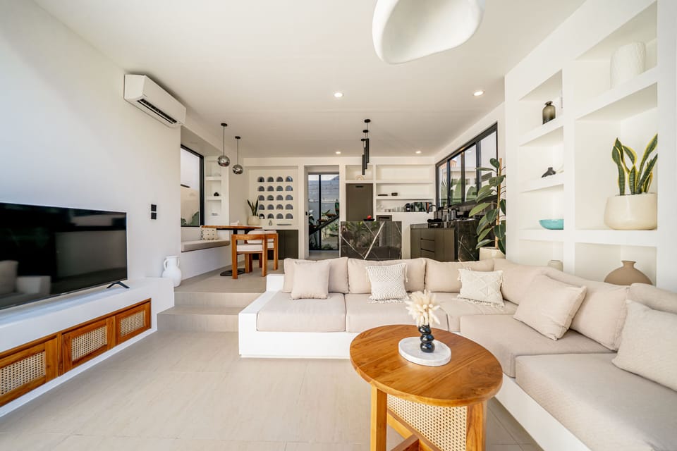 Luxury Villa, 1 King Bed, Pool View | Living room | 55-inch TV with cable channels