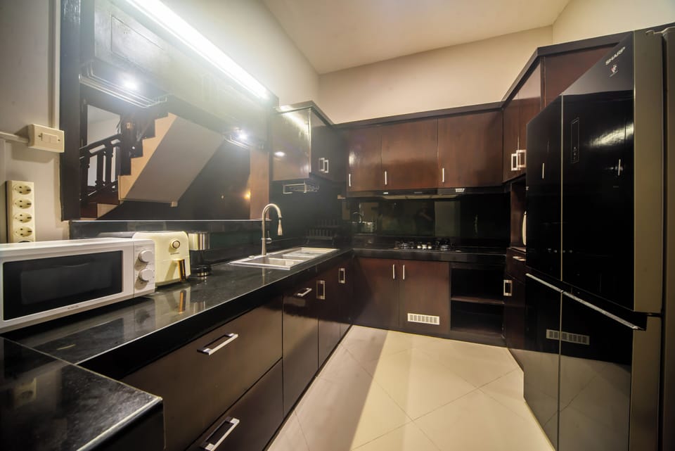Villa, Pool View | Private kitchen | Full-size fridge, microwave, oven, stovetop