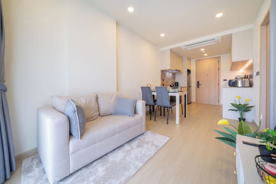 Double Room, Balcony, Garden View | Living area | 55-inch Smart TV with digital channels