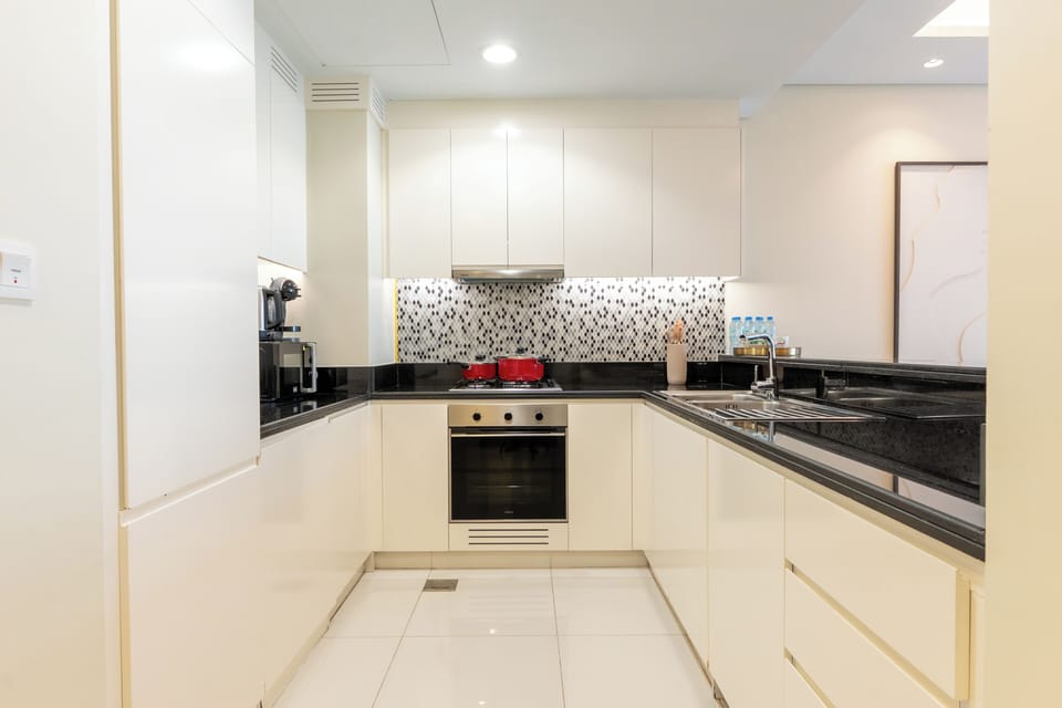Deluxe Apartment, City View | Private kitchen | Coffee/tea maker, fridge, microwave, oven