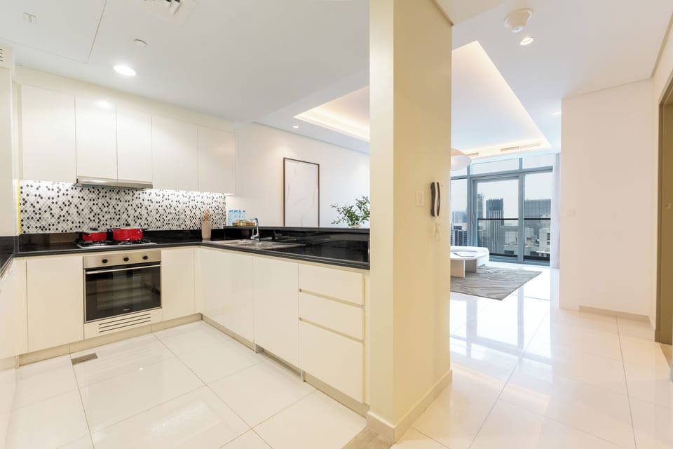 Deluxe Apartment, City View | Private kitchen | Coffee/tea maker, fridge, microwave, oven