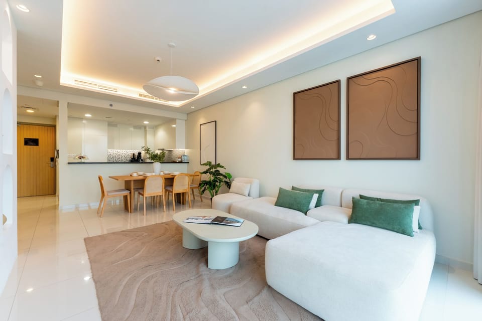 Deluxe Apartment, City View | Living area | 65-inch Smart TV with digital channels