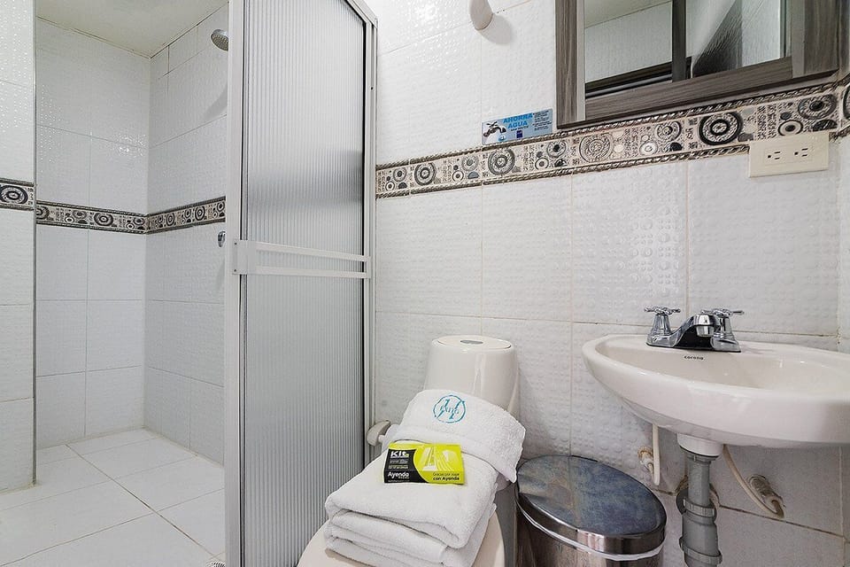 Shower, towels, soap, shampoo