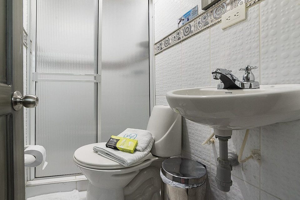 Shower, towels, soap, shampoo
