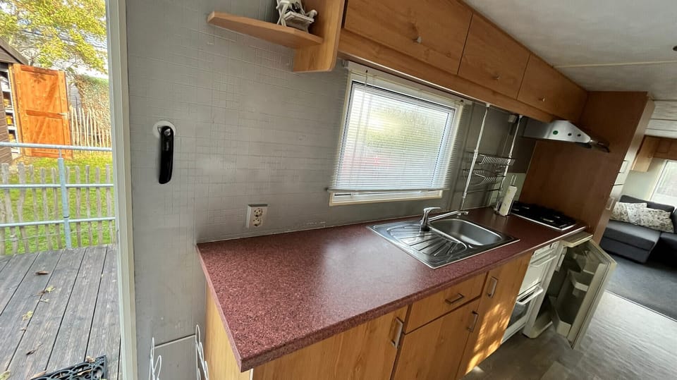 Kitchen with refrigerator and oven