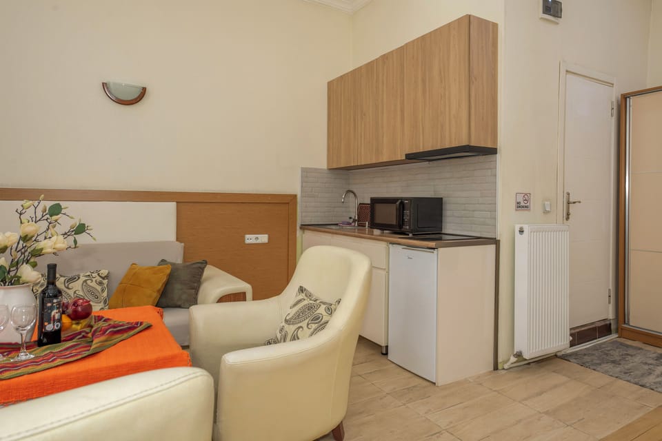 Studio, City View | Living area | 37-inch LCD TV with digital channels