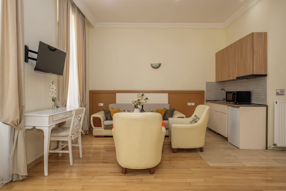 Studio, City View | Living area | 37-inch LCD TV with digital channels