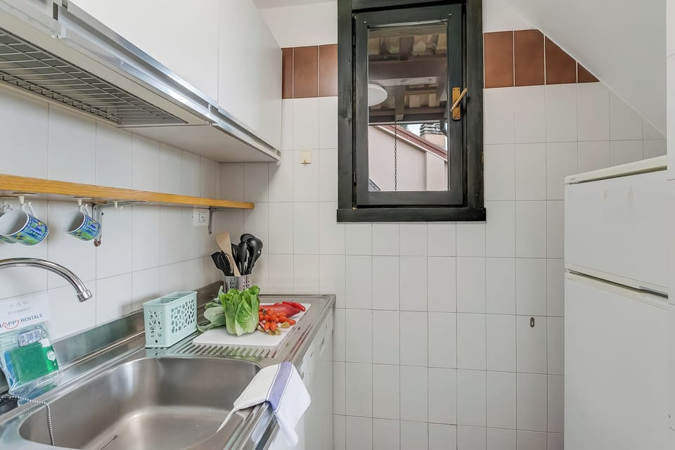 Family Townhome, Multiple Bedrooms, 2 Bathrooms, Mountainside (Oasi Nel Parco With Pool) | Private kitchen | Fridge, microwave, stovetop, coffee/tea maker