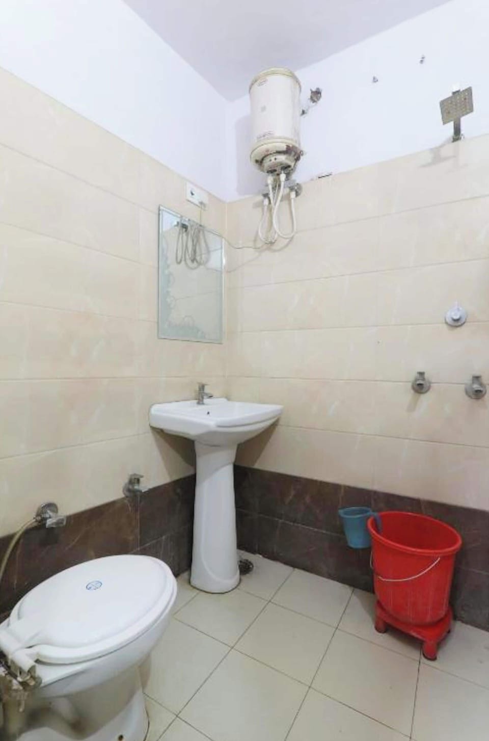 Shower, rainfall showerhead, slippers, towels