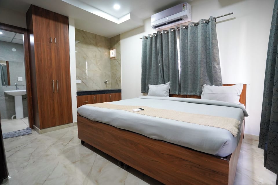 Deluxe Room, Balcony, City View | Desk, laptop workspace, free WiFi