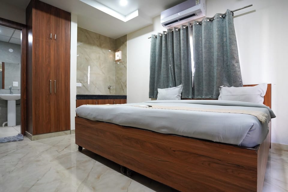 Deluxe Room, Balcony, City View | Desk, laptop workspace, free WiFi